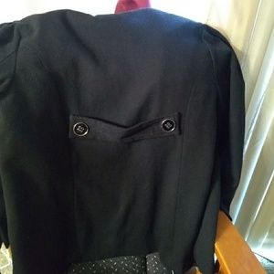 Women's jacket with stylish buttons